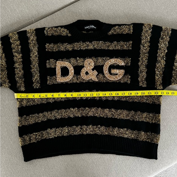 DOLCE&GABBANA
Cashmere blends
Black and gold sweater - Picture 10 of 13